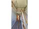 Grand foyer featuring hardwood floors, staircase with wooden rails, and chandelier at 8731 Sheltonham Way, Charlotte, NC 28216