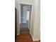 Hallway featuring modern colors and paint at 8731 Sheltonham Way, Charlotte, NC 28216