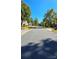 Quiet street featuring a well maintained neighborhood with mature trees and grassy lawns at 8731 Sheltonham Way, Charlotte, NC 28216