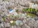 An aerial view of the home, featuring a basketball court and solar panels at 10000 Blossom Dr, Concord, NC 28025