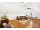 Spacious living area with vaulted ceilings, hardwood floors, and modern decor at 10000 Blossom Dr, Concord, NC 28025