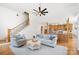 Spacious living area with open floor plan, visible kitchen and staircase at 10000 Blossom Dr, Concord, NC 28025