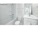 Bright bathroom with a shower-tub combo, white cabinets and a stylish vanity mirror at 1014 Hostler Ln, York, SC 29745