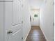Inviting entryway featuring hardwood floors, white walls, and a classic front door with glass panels at 1014 Hostler Ln, York, SC 29745