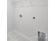 Functional laundry room featuring tiled floors and convenient electrical outlets at 1014 Hostler Ln, York, SC 29745