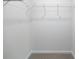 Spacious walk-in closet equipped with shelving and carpeting for easy organization at 1014 Hostler Ln, York, SC 29745