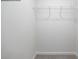 Spacious walk-in closet equipped with shelving and carpeting for easy organization at 1014 Hostler Ln, York, SC 29745