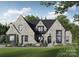 Stunning brick home with a manicured lawn and beautifully landscaped front yard at 102 Pecan Cove Ln, Weddington, NC 28104