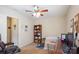 Bedroom featuring a ceiling fan, desk, and a shelf for storage or display at 1021 Joselynn Dr, Gastonia, NC 28054