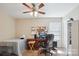 Bedroom featuring a ceiling fan, desk, and a window offering natural light at 1021 Joselynn Dr, Gastonia, NC 28054