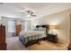 Comfortable primary bedroom with a ceiling fan, large bed, and natural light at 1021 Joselynn Dr, Gastonia, NC 28054