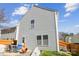 Exterior view of the home with blue skies, siding, and fenced backyard at 1021 Joselynn Dr, Gastonia, NC 28054