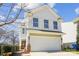 Charming two-story home featuring a garage and manicured landscaping at 1021 Joselynn Dr, Gastonia, NC 28054