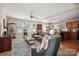 Inviting living room with comfortable seating, a ceiling fan, and open layout to dining area at 1021 Joselynn Dr, Gastonia, NC 28054