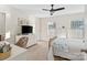 Bedroom with a neutral color scheme, a gold bed frame, and a large window at 1065 Ellis Pond Dr, Rock Hill, SC 29730