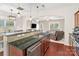 Open-concept kitchen features granite countertops, stainless steel appliances, and views into the living room at 1065 Ellis Pond Dr, Rock Hill, SC 29730
