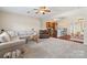 Spacious living room with views of the kitchen and dining area, perfect for entertaining at 1065 Ellis Pond Dr, Rock Hill, SC 29730