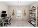 Cozy home office with a desk setup, guitars, and decorative shelving, ideal for productivity at 1065 Ellis Pond Dr, Rock Hill, SC 29730