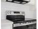 Close up of stainless steel kitchen stove with white subway tile backsplash at 10720 Forest Dr, Matthews, NC 28105