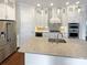 Gourmet kitchen with stainless steel appliances, and a large island at 11005 Cobb Creek Ct, Charlotte, NC 28277