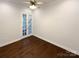Office space featuring hardwood floors and glass doors at 11005 Cobb Creek Ct, Charlotte, NC 28277