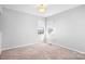 Bedroom with neutral carpet and natural light streaming in through the windows at 11132 White Stag Dr, Charlotte, NC 28269
