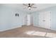 A spacious bedroom features neutral carpet and a double door closet at 11132 White Stag Dr, Charlotte, NC 28269