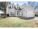 Charming two-story home with gray siding, a one-car garage, and a well-maintained front lawn at 11132 White Stag Dr, Charlotte, NC 28269