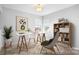 Home office featuring desk, plants and bookshelves at 11132 White Stag Dr, Charlotte, NC 28269