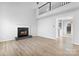 Living room featuring a fireplace and sleek floors, offering a modern and inviting atmosphere at 11132 White Stag Dr, Charlotte, NC 28269