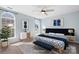 Stylish main bedroom with neutral tones, modern furniture, and large windows for natural light at 11132 White Stag Dr, Charlotte, NC 28269