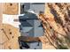Birds-eye view of a property showcasing the roof, driveway, yard, and surrounding trees at 119 Mills Garden Rd, Statesville, NC 28625