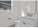 Bathroom features modern vanity with white countertop and black hardware at 119 Mills Garden Rd, Statesville, NC 28625