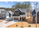 Well-designed home with lush backyard, long driveway, and modern architectural elements at 119 Mills Garden Rd, Statesville, NC 28625