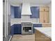 Beautiful kitchen with a large island, stainless steel appliances, and contrasting cabinet colors at 119 Mills Garden Rd, Statesville, NC 28625