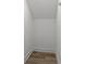 Cozy under-stair storage space with durable floors, offering practical home organization at 119 Mills Garden Rd, Statesville, NC 28625