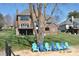Expansive backyard with mature trees and direct access to the water at 126 Anchor Ln, Troutman, NC 28166