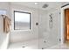 Beautifully tiled shower with glass door and modern fixtures at 126 Anchor Ln, Troutman, NC 28166