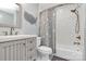 Clean bathroom features a vanity with a sink, a toilet, and a shower-tub combo with white subway tile at 126 Anchor Ln, Troutman, NC 28166