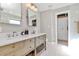 Modern bathroom with double vanity sinks, marble countertops, and stylish fixtures at 126 Anchor Ln, Troutman, NC 28166