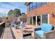 Outdoor deck with comfortable seating, offering scenic views and a relaxing space to enjoy the outdoors at 126 Anchor Ln, Troutman, NC 28166