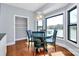 Charming dining area with lake views and modern lighting fixtures at 126 Anchor Ln, Troutman, NC 28166