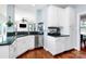 Bright kitchen featuring white cabinets, stainless steel appliances and granite countertops at 126 Anchor Ln, Troutman, NC 28166