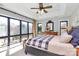 Spacious main bedroom with a large window offering stunning views and a tray ceiling at 126 Anchor Ln, Troutman, NC 28166