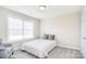 Cozy bedroom with a neutral color palette, plush carpeting, and a comfortable-looking queen bed at 12889 Hill Pine Rd, Midland, NC 28107
