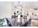 Beautiful dining space with an open concept layout offering views into the living room and kitchen at 12889 Hill Pine Rd, Midland, NC 28107