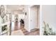 Bright living room with hardwood floors, flowing into the kitchen, and ample natural light at 12889 Hill Pine Rd, Midland, NC 28107