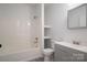 Cozy bathroom with tub/shower combo, gray vanity, and mirrored cabinet at 1411 Roseland Dr, Lincolnton, NC 28092