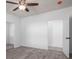 Bedroom featuring a ceiling fan, light walls, and multiple closets at 1411 Roseland Dr, Lincolnton, NC 28092
