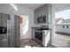 Eat-in kitchen featuring stainless steel appliances, gray cabinets, granite countertops, and vinyl floor at 1411 Roseland Dr, Lincolnton, NC 28092